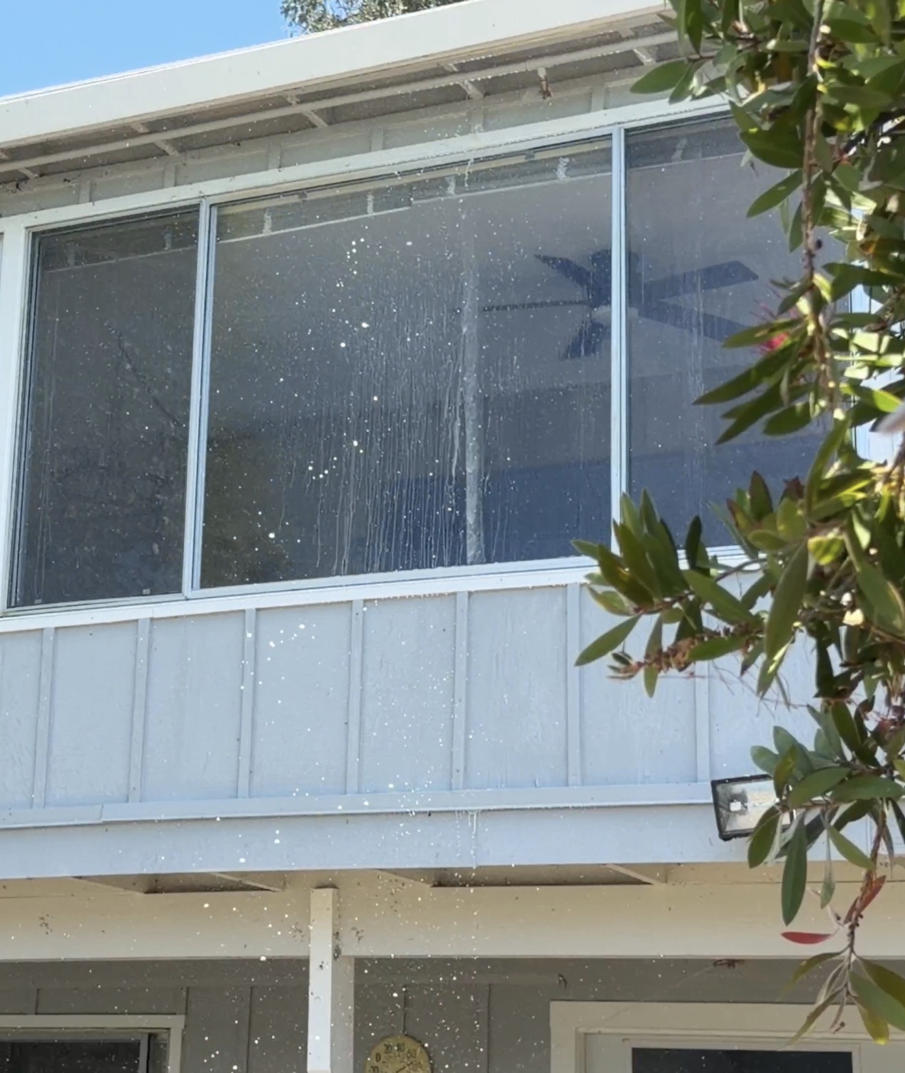 Water covering windows and siding during activation